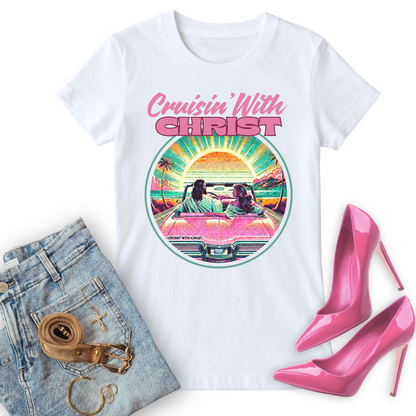 Cruisin' with Christ Christian T Shirt for women, paired with jeans, gold accessories and pink stiletto heels.