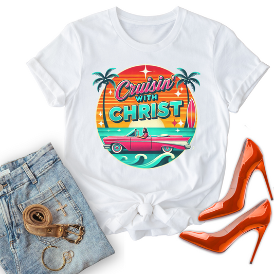 White christian t-shirts with 'Cruisin' with Christ' design, paired with jeans and red high heels on a white background.
