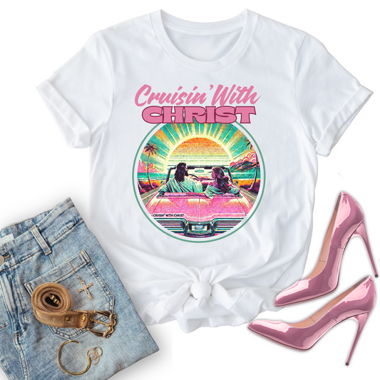White christian t-shirts with 'Cruisin' With Christ' design, paired with jeans and high heels on a white background